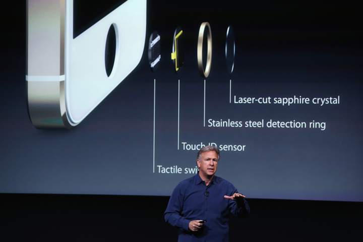 Apple Senior Vice President of Worldwide Marketing Phil Schiller speaks about Touch ID during an Apple product announcement at the Apple campus.