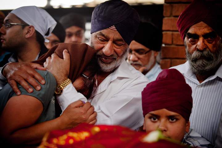 Mourners gather at the Sikh funeral of Dalvinder Kaur Ghataurhae and her grandson Pavraj Singh Ghataurhae, 16, at the Hindi Crematorium in Nairobi on September 25, 2013, after they were killed in the attack on Nairobi’s Westgate shopping mall. (Photo credit: Getty Images)