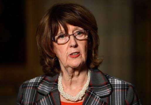 Senator Marjory LeBreton talks to media in Senate Foyer on Parliament Hill in Ottawa, on May 9, 2013. LeBreton says she's stepping down as Conservative leader in the Senate. THE CANADIAN PRESS/Sean Kilpatrick.