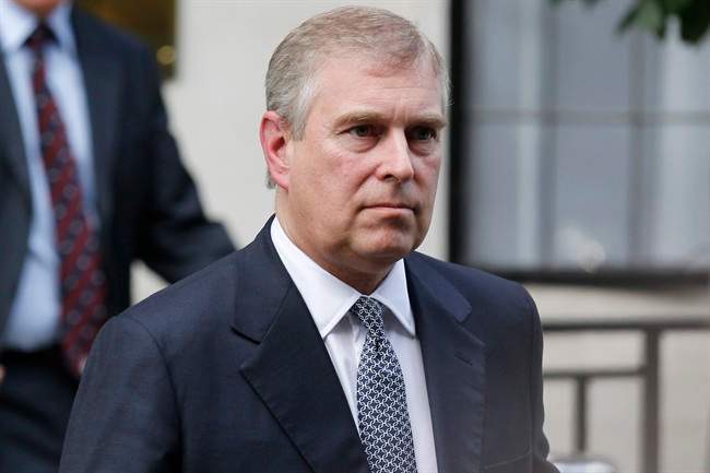 In this Wednesday, June 6, 2012 file photo, Britain's Prince Andrew leaves King Edward VII hospital in London after visiting his father Prince Philip .