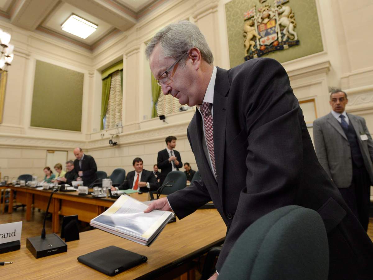 Chief electoral officer Marc Mayrand arrives at the Commons house affairs committee in Ottawa on Tuesday May 28, 2013. Adrian Wyld/The Canadian Press