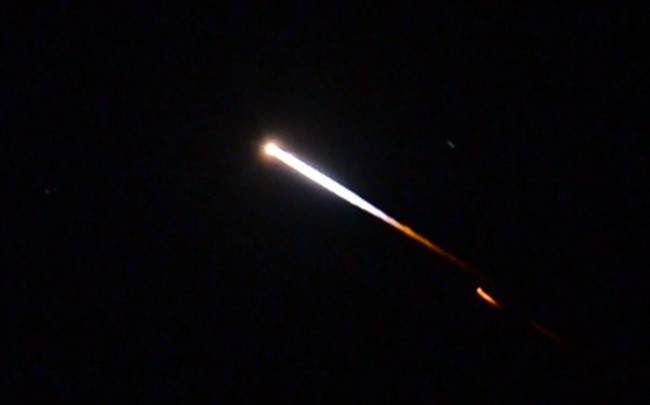 An unmanned Minotaur rocket carries NASA’s LADEE spacecraft after launching to the moon from Virginia’s Eastern Shore on Friday, Sept. 6, 2013.