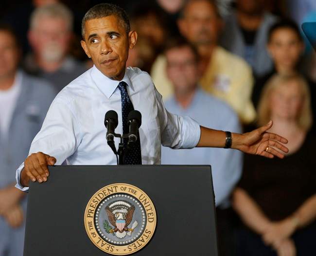 President Barack Obama gestures as he speaks to workers at the Ford Kansas City Stamping Plant in Liberty, MO., Friday, Sept. 20, 2013. 