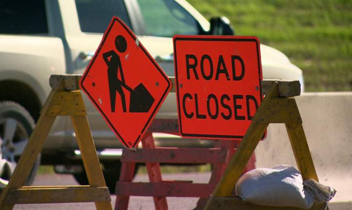 Police looking for suspect after hit and run leaves man working in a construction zone injured.