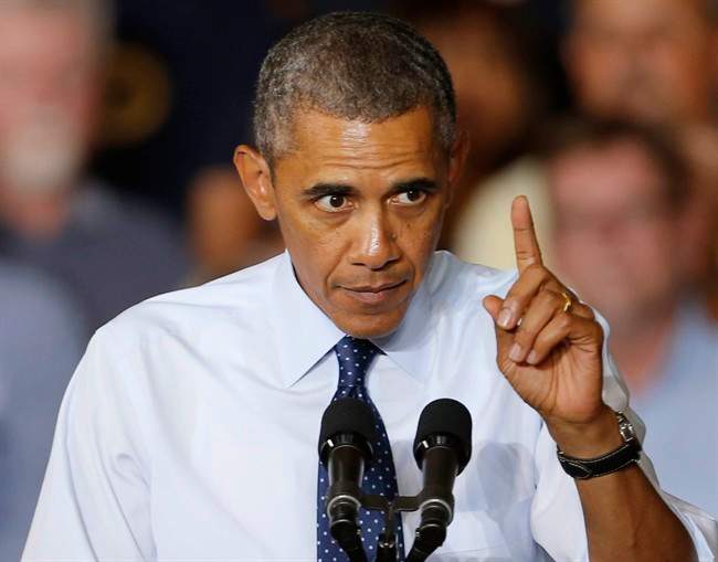 In this Sept. 20, 2013, photo, President Barack Obama gestures as he speaks to workers at the Ford Kansas City Stamping Plant in Liberty, Mo. Obama arrives at the United Nations on Monday, Sept. 23, with diplomatic openings, the result of help from unexpected partners, on three fronts: Iran, Syria, and elusive peace between Israel and the Palestinians. All three pathways are fraught with potential pitfalls and hinge on cooperation from often unreliable nations. 