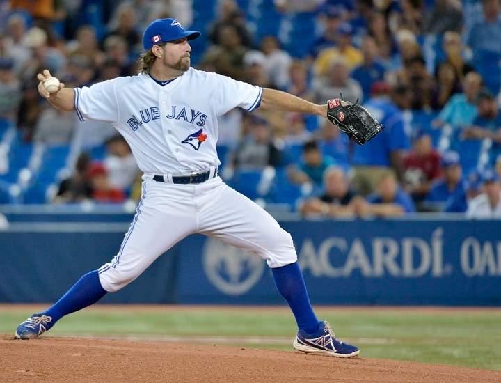 Toronto Blue Jays starting pitcher R.A. Dickey throws against the Los Angeles Angels during first inning AL baseball action in Toronto on Wednesday, Sept. 11, 2013. 