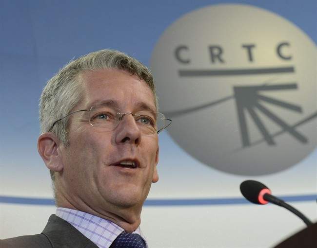 Canadian Radio-television and Telecommunications Commission Chairman Jean-Pierre Blais talks with media about the Bell-Astral decision, Thursday June 27, 2013 in Gatineau, Que.