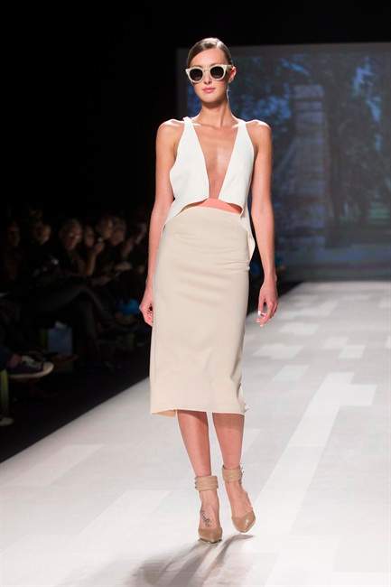 A model shows a creation from Matthew Gallagher while walking the runway during Toronto Fashion Week in Toronto on Wednesday October 23, 2013. 