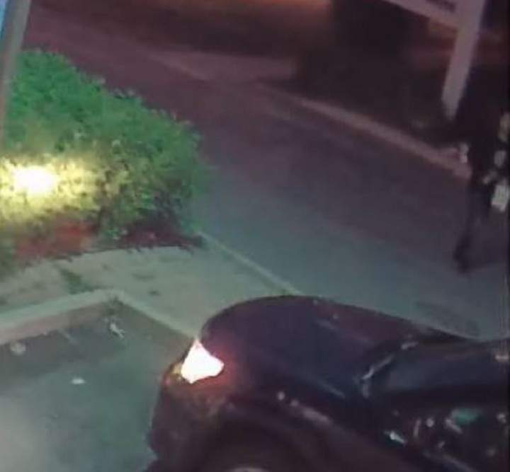 Police surveillance of Ford and Lisi with packages at a Scarlett Road gas station - image