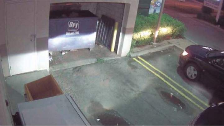 Police surveillance of Ford and Lisi with packages at a Scarlett Road gas station - image