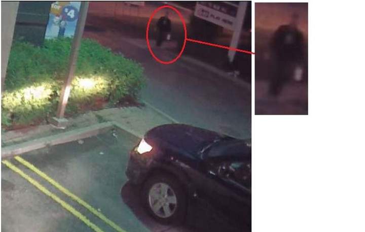 Police surveillance of Ford and Lisi with packages at a Scarlett Road gas station - image