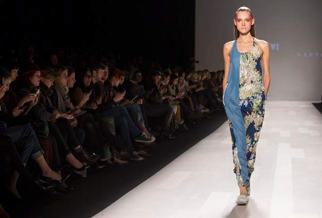 A model walks the runway in the Melissa Nepton show during Toronto Fashion Week in Toronto, Tuesday October 22, 2013. 
