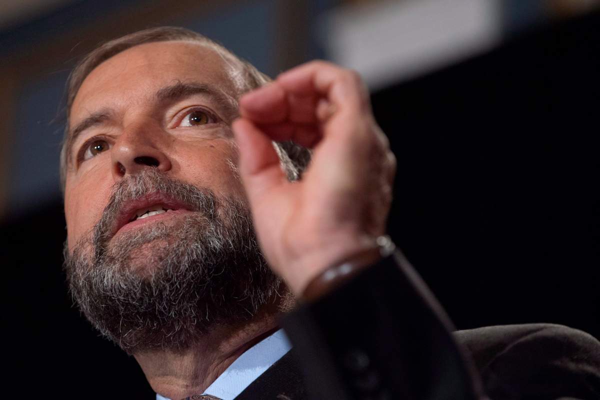 NDP leader Tom Mulcair addresses party members at a national caucus strategy session on Wednesday, September 11, 2013 in Saskatoon.
