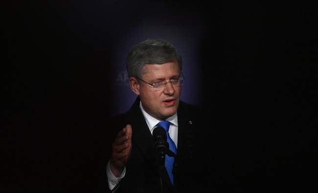 Prime Minister Stephen Harper takes part in a closing press conference in Nusa Dua, Bali, Indonesia on Tuesday, October 8, 2013. THE CANADIAN PRESS/Sean Kilpatrick.