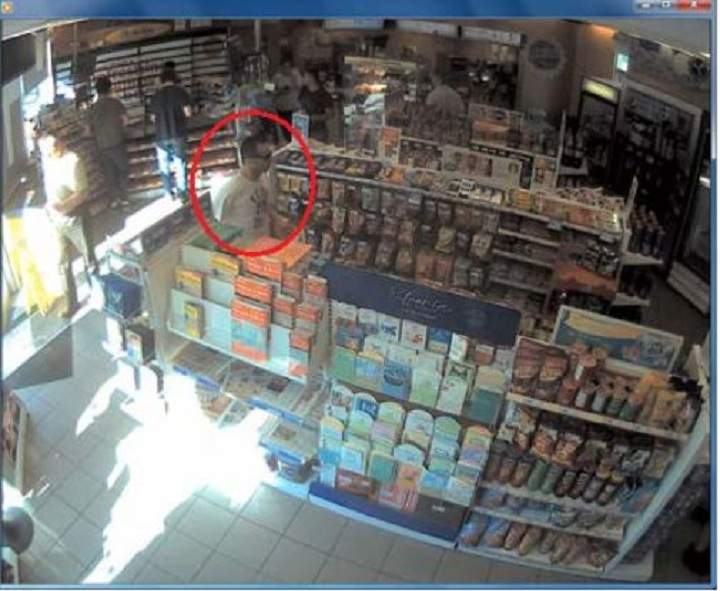 Police surveillance of Ford and Lisi with packages at a Scarlett Road gas station - image