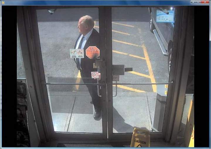 Police surveillance of Ford and Lisi with packages at a Scarlett Road gas station - image