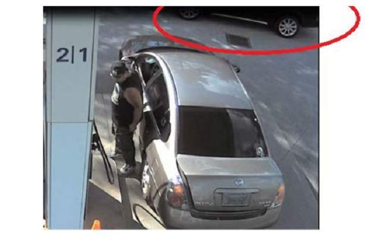 Police surveillance of Ford and Lisi with packages at a Scarlett Road gas station - image