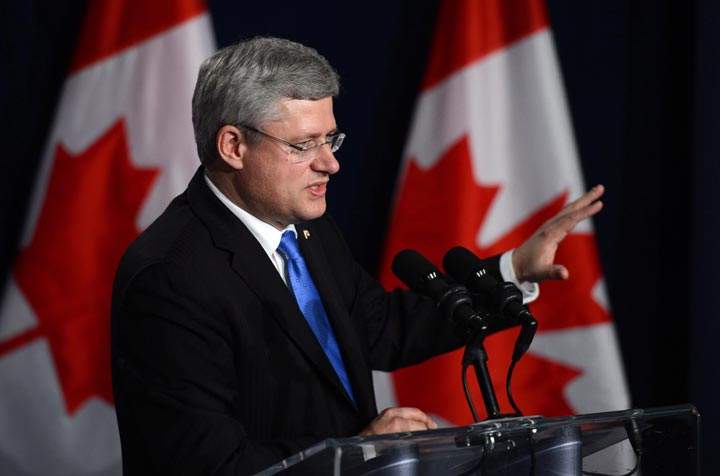 Prime Minister Stephen Harper takes part in a closing press conference in Nusa Dua, Bali, Indonesia on Tuesday, October 8, 2013. 