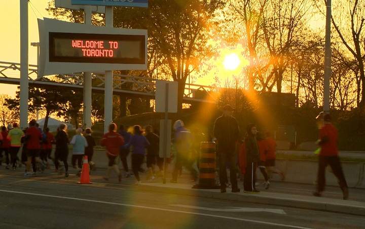 Runners participate in the Toronto Waterfront Marathon on Sunday.