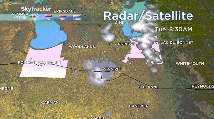 The pale pink areas are under snow squall warnings Tuesday morning.