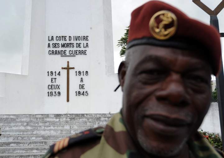 An Ivorian World War II veteran leaves a monument in memory of WWI and WWII soldiers on November 11, 2013 in Abidjan after the Armistice Day ceremonies marking the end of World War I (Sia Kambou/Getty Images)