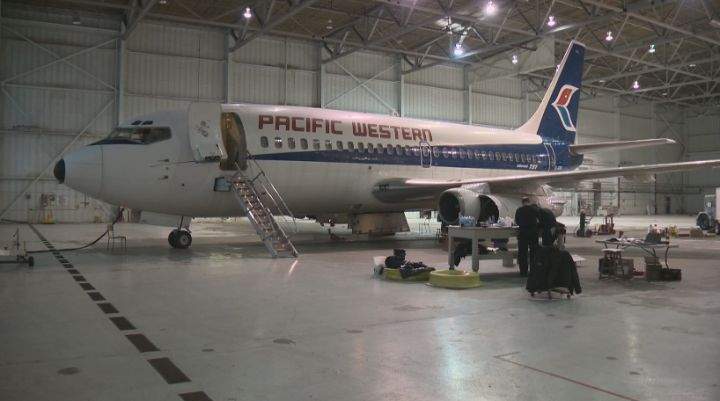 Crews work to inspect the Boeing 737 at the Alberta Aviation Museum Thursday, November 28, 2013.