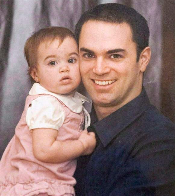 Guy Turcotte holds his daughter Anne-Sophie in an undated handout photo.