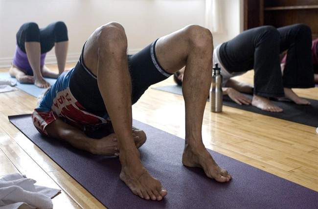 FILE -- The new yoga program for people with Parkinson's grew from a boxing program for people with the same disease.