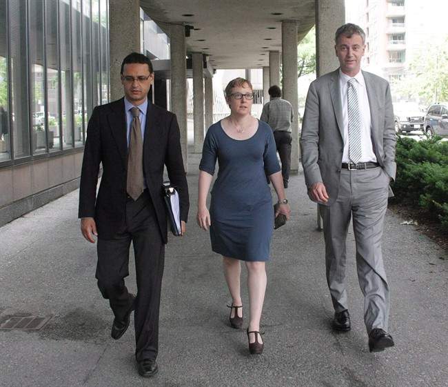 Julian Roy (left to right), lawyer for Ashley Smith's family, Breese Davies, lawyer for the Canadian Association of Elizabeth Fry Societies, and Richard Macklin, lawyer for Ontario's child advocate, are seen outside the Smith prison-death inquest in Toronto on Tuesday, June 25, 2013.