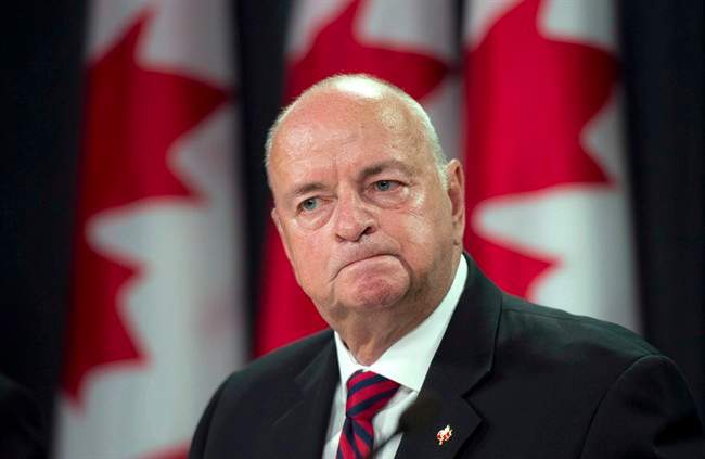 Canada's Veterans Ombudsman Guy Parent speaks after releasing the Report on the New Veterans Charter and Actuarial Analysis on Oct. 1, 2013 in Ottawa.