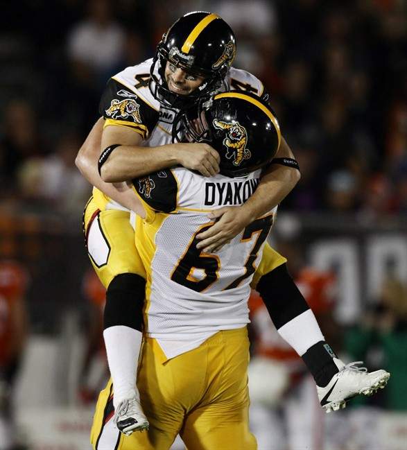 Peter Dyakowski - Offensive lineman, Tiger-Cats

Dyakowski (#67) may not be the flashiest player at the Grey Cup, but he may be the most interesting. The 6’5”, 325-pound lineman suffered a major knee injury in last year’s Grey Cup game. After nearly a year of recovery, he finally got into the Ticats lineup during the East Division final last week. At this year’s Grey Cup, the native of Vancouver will be facing his old high school teammate Matt Walter, who plays for the Stampeders. Oh yeah, and he was once voted Canada’s Smartest Person.