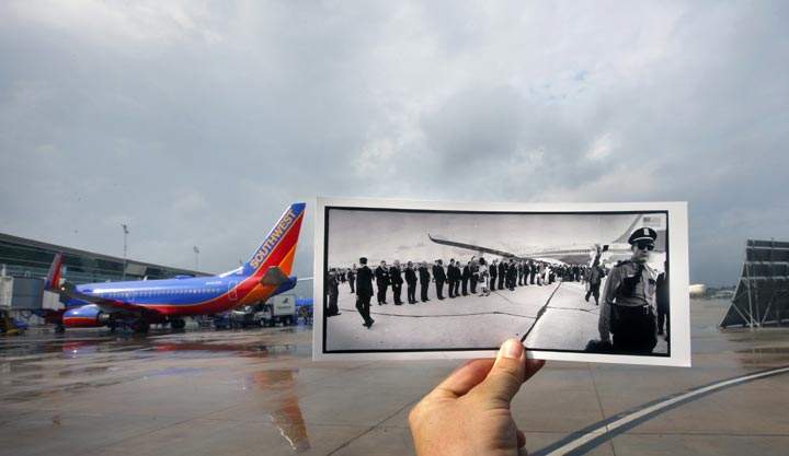 This Oct. 30, 2013 photo shows an image taken Nov. 21, 1963, of U.S. President John F. Kennedy shaking hands with 22 prominent Houstonians after he and first lady Jacqueline Kennedy arrived at Houston International Airport, juxtaposed against the current William P. Hobby Airport in Houston. Kennedy was assassinated the following day. The airport’s name was changed to William P. Hobby Airport in 1967 in honour of the Texas governor, and the current-day terminal was finished in 2003. The original location where Air Force One was parked in the original photo is no longer an open area; it is now a parking toll plaza. (AP Photo/Houston Chronicle, Cody Duty)