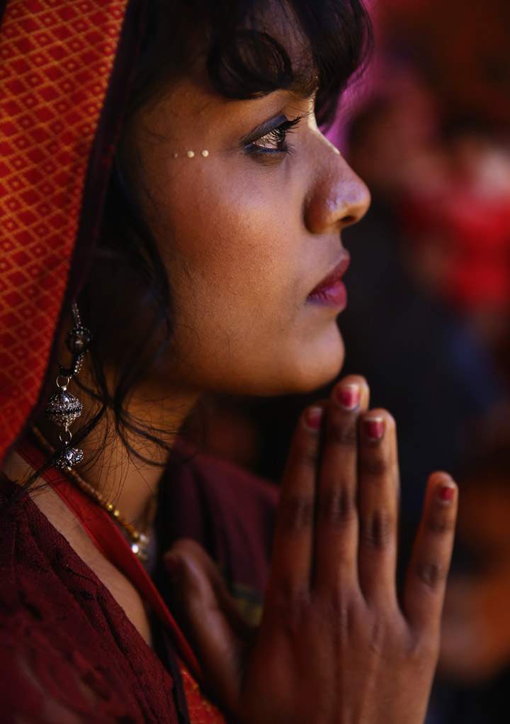 A woman prays in the temple during Diwali celebrations at Bhaktivedanta Manor on November 3, 2013 in Watford, United Kingdom.  (Photo by Dan Kitwood/Getty Images)