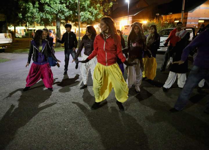 A dance troop rehearse their moves as they celebrate the Hindu festival of Diwali on November 3, 2013 in Leicester, United Kingdom. (Photo credit: Getty Images)