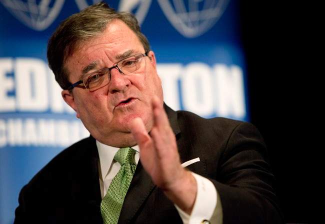 Federal Finance Minister Jim Flaherty delivers an update of economic and fiscal projections in Edmonton on Tuesday, November 12, 2013. 