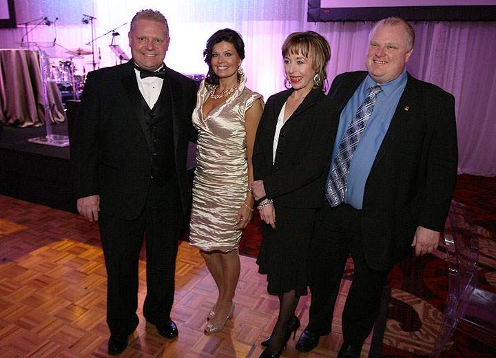 Doug Ford and his wife Karla pose with Renata and Rob Ford at a charity gala in 2011. (John R. Kennedy / Global News)