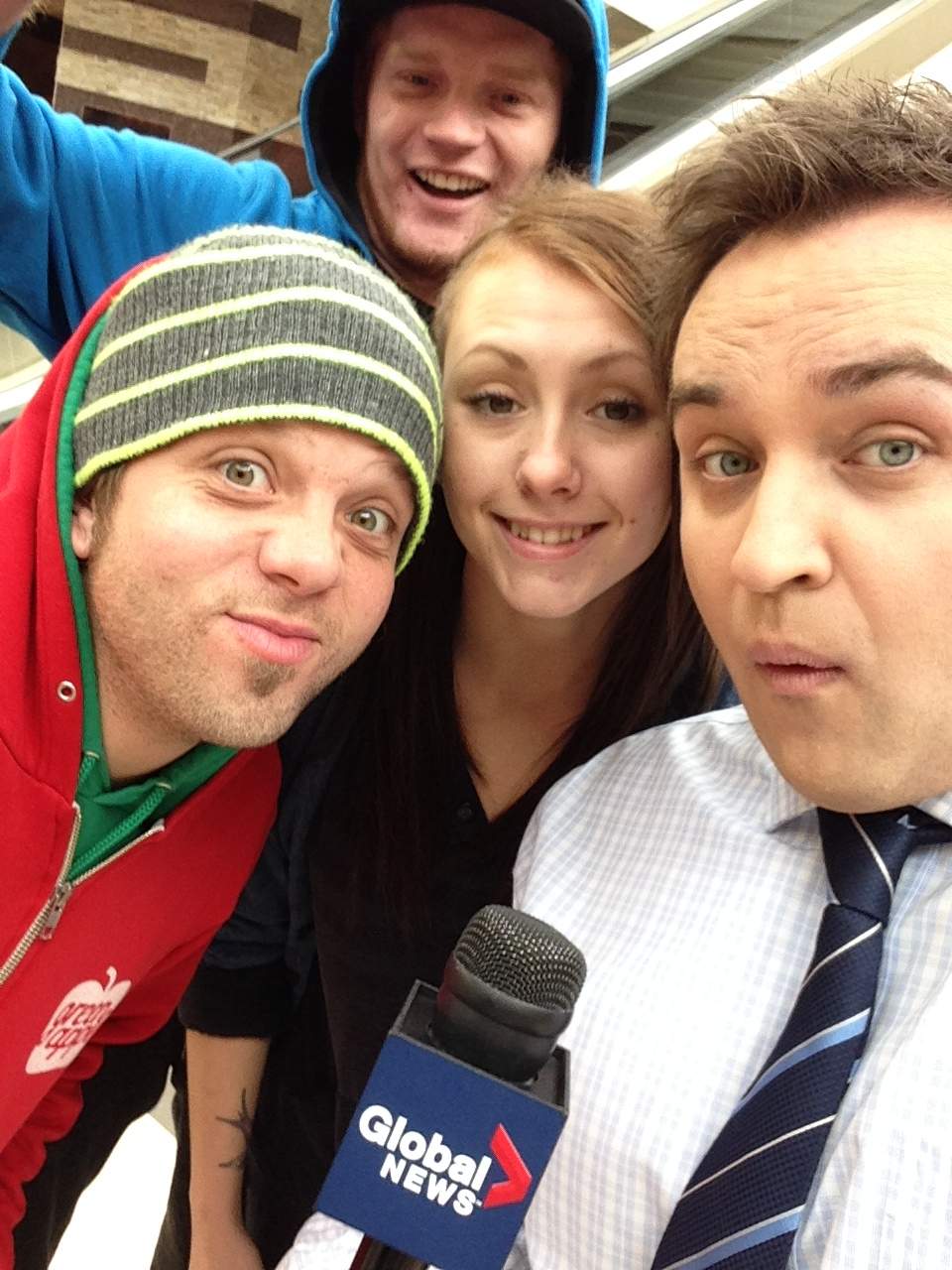 Shoppers at Polo Park Mall take part in a "selfie", The Oxford Dictionary's "Word of the Year"