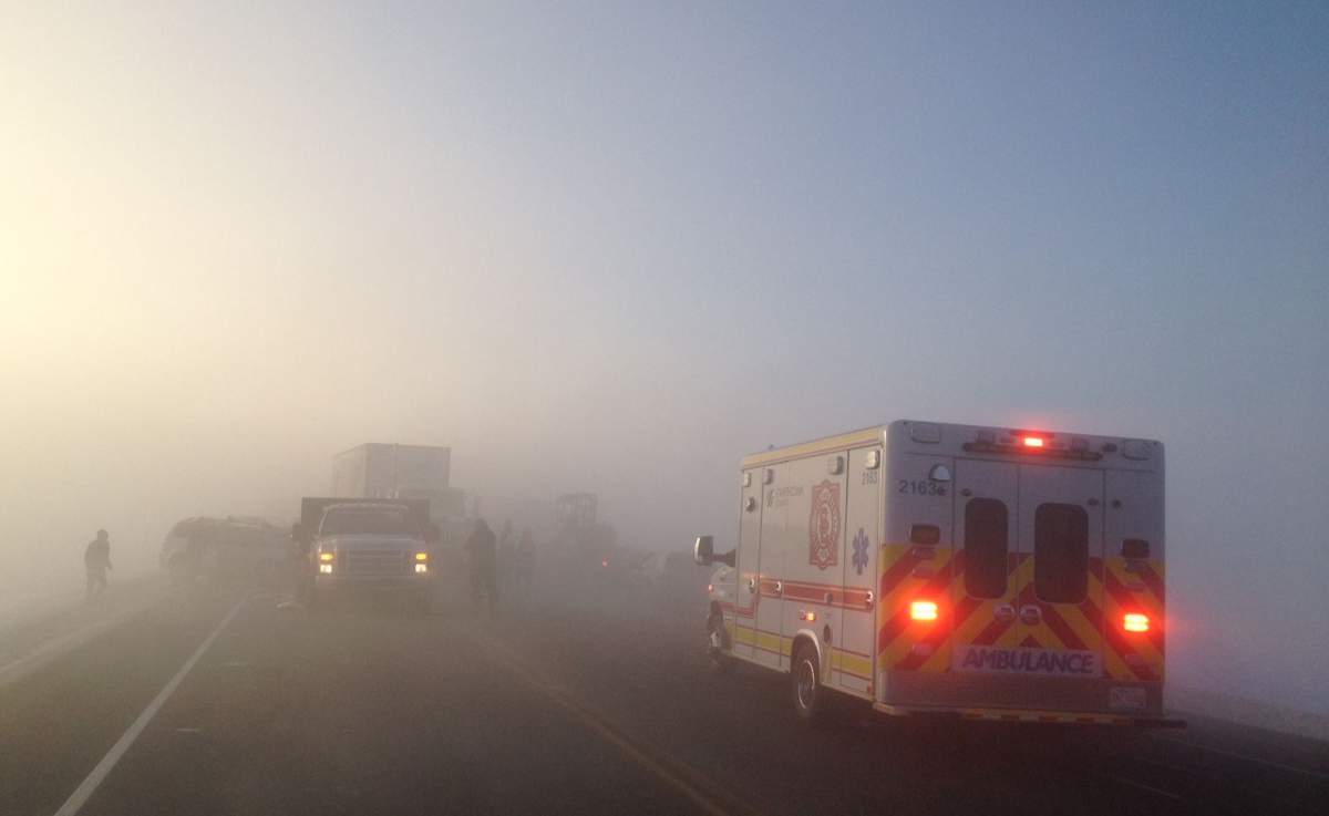 Emergency crews respond to a 40-car pileup on Highway 21 Wednesday morning.
