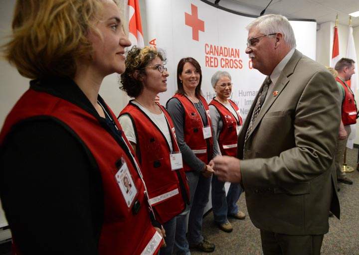 John Byrne, Director General Disaster Management of the Canadian Red Cross, talks to Canadian Red Cross aid workers prior to their deployment to the Philippines in Ottawa on Wednesday, November 13, 2013. 