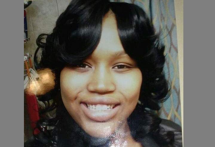 In this undated file photo is the cover of a funeral program showing 19-year-old Renisha McBride from a service in Detroit.