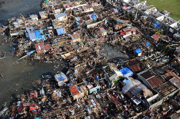 This aerial photo shows destroyed houses in the town of Guiuan in Eastern Samar province, central Philippines on November 11, 2013, four days after devastating Typhoon Haiyan hit the country. (Ted Aljibe/AFP/Getty Images)