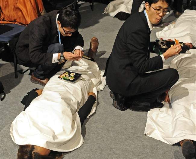 Japan dials back climate change emissions target - image