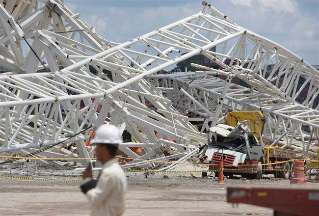 The accident that resulted in the death of at least two workers, occurred when a construction crane crashed into a 500-ton metal structure that in turn cut through the outer walls of the venue, destroying rows of seats and slamming into a massive LED panel that runs across the stadium's facade. The stadium is slated to host the 2014 World Cup opener.