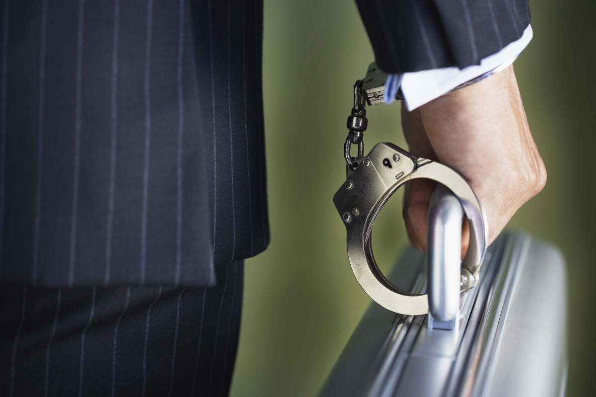 A former executive at a Winnipeg crane company has been charged with millions of dollars in fraud.