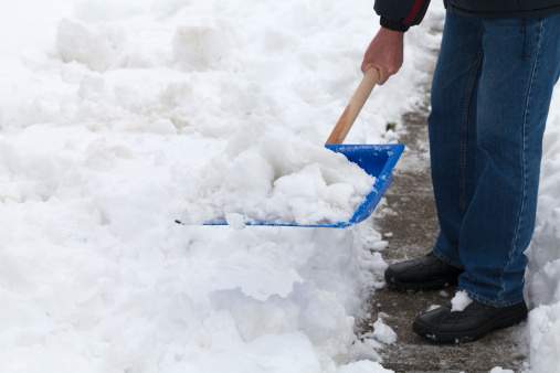 Police say he was shovelling the snow off his balcony when he fell head first on the icy ground.
