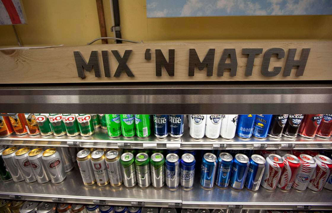 A selection of beers on sale at a mix'n'match cooler at a Beer Store location in Ontario. Most of the brands in view are owned by The Beer Store's brewer owners.