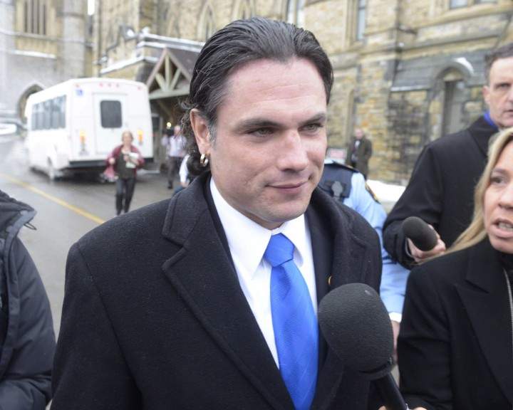 Sen. Patrick Brazeau talks to media on Parliament Hill in Ottawa, Tuesday, Feb.12, 2013. THE CANADIAN PRESS/Adrian Wyld