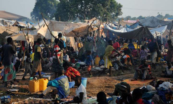 People gather at a refugee camp near the airport in Bangui, Central African Republic