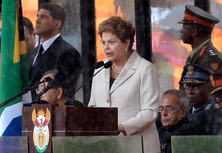 Brazil’s President Dilma Rousseff delivers a speech during the memorial service for late South African President Nelson Mandela at Soccer City Stadium in Johannesburg on December 10, 2013. (Photo credit: Getty Images)