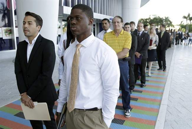 Students wait in line at an internship job fair.